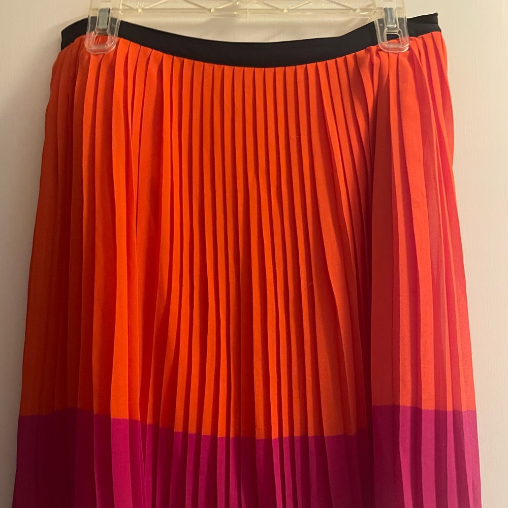 Orange and pink pleated skirt